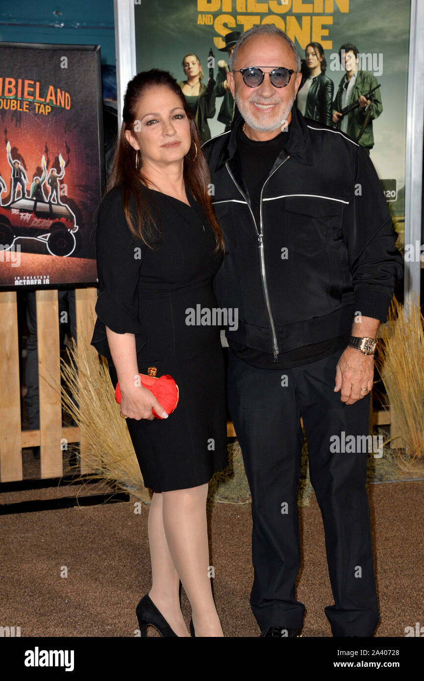 Los Angeles, Stati Uniti d'America. 10 ottobre, 2019. Gloria Estefan & Emilio Estefan alla premiere di " "Zombieland": doppio rubinetto' al Regency Village Theatre. Immagine: Paul Smith/Featureflash Credito: Paul Smith/Alamy Live News Foto Stock