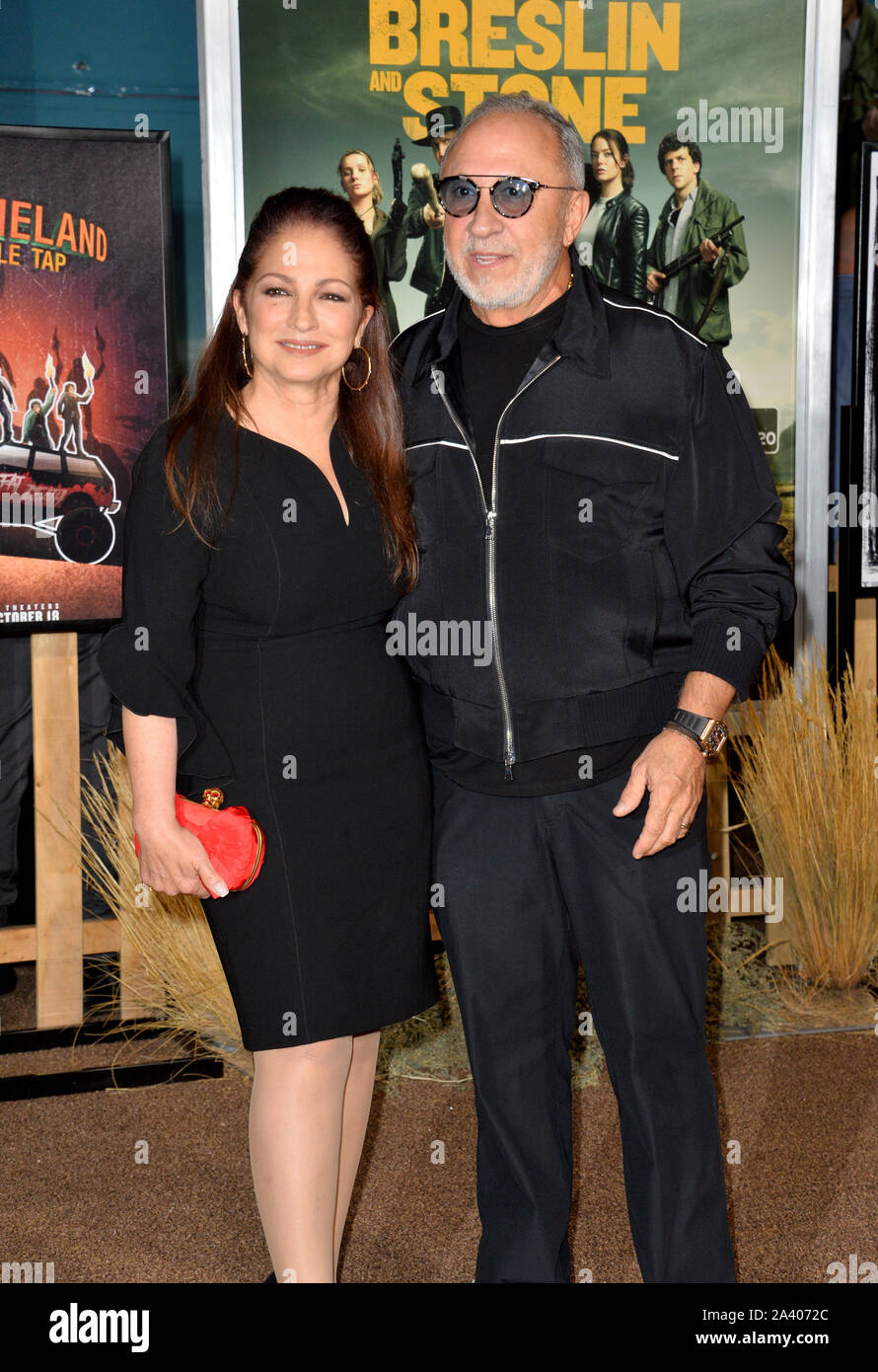 Los Angeles, Stati Uniti d'America. 10 ottobre, 2019. Gloria Estefan & Emilio Estefan alla premiere di " "Zombieland": doppio rubinetto' al Regency Village Theatre. Immagine: Paul Smith/Featureflash Credito: Paul Smith/Alamy Live News Foto Stock