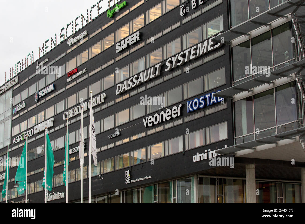 Loghi di molti diversi marchi visibili sull'edificio in Lindholmen Science Park, a Göteborg. Foto Stock