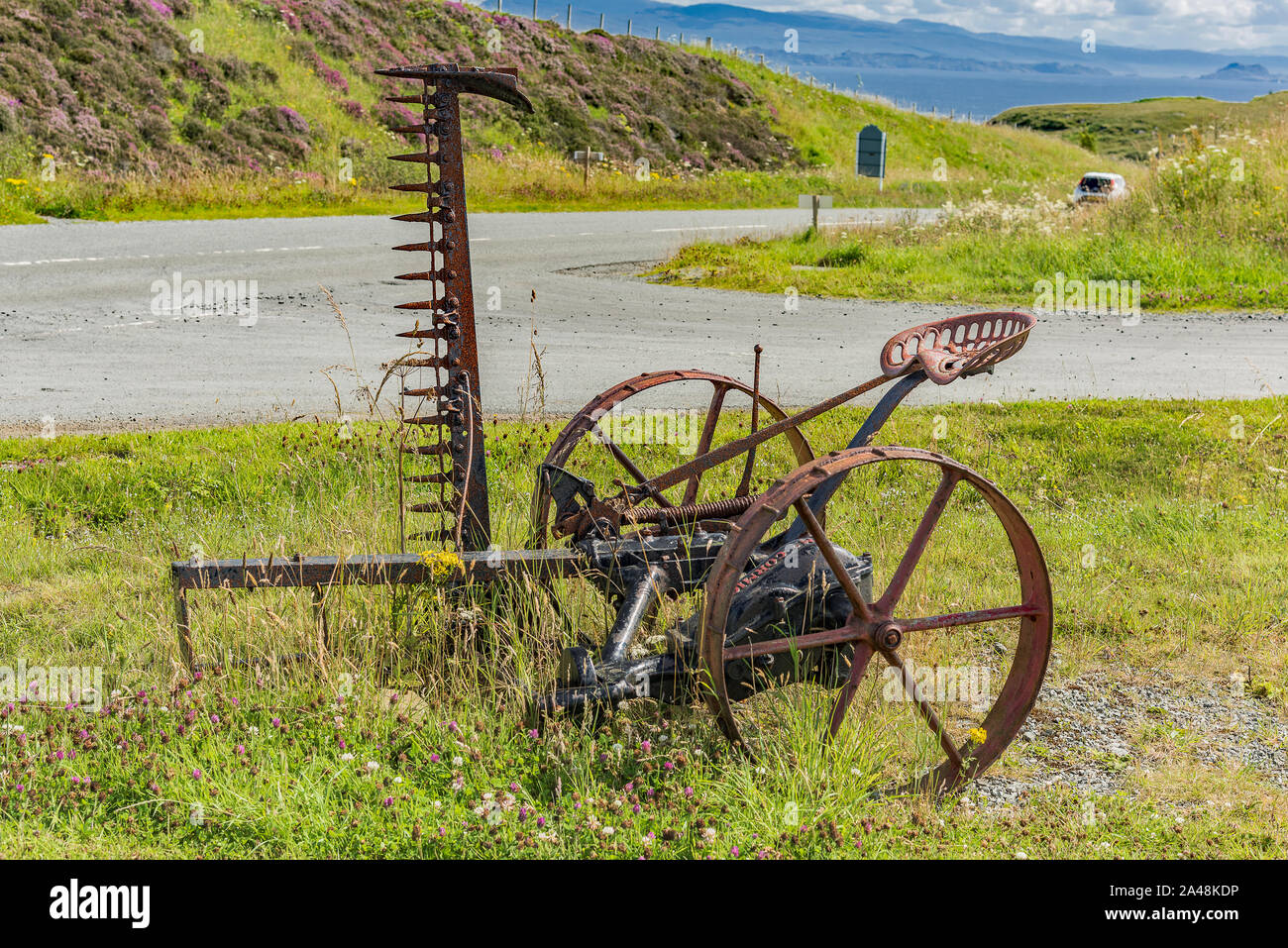 Antique McCormick Horse-Drawn tosaerba di fieno, Ellishadder, Isola di Skye Foto Stock