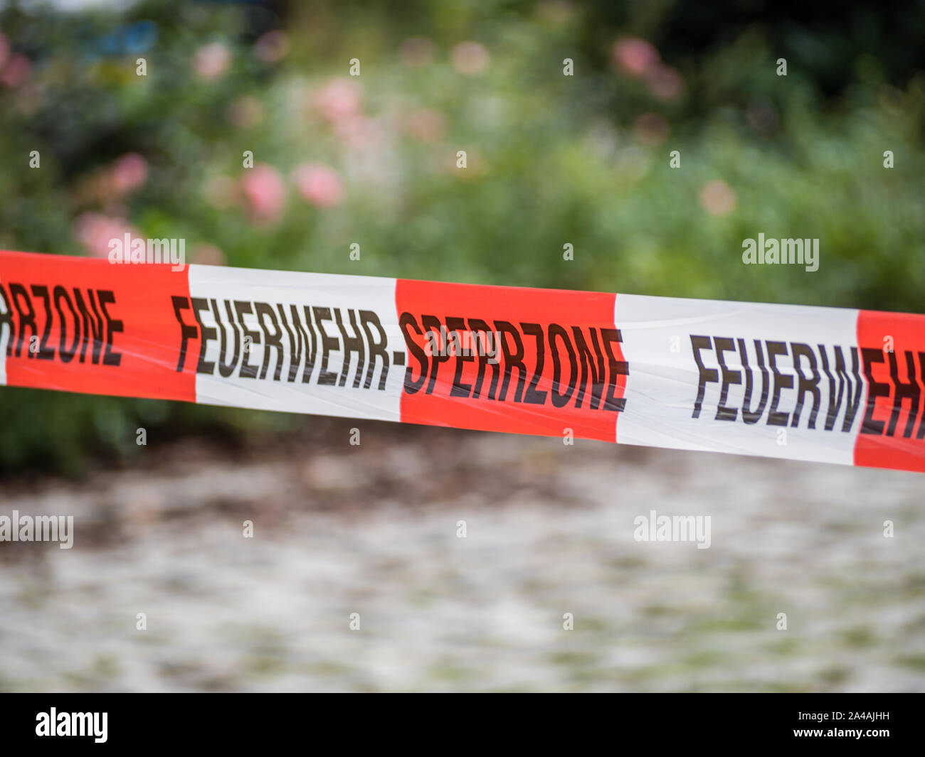 Vigili del fuoco banda di flutter per spegnere area riservata Foto Stock