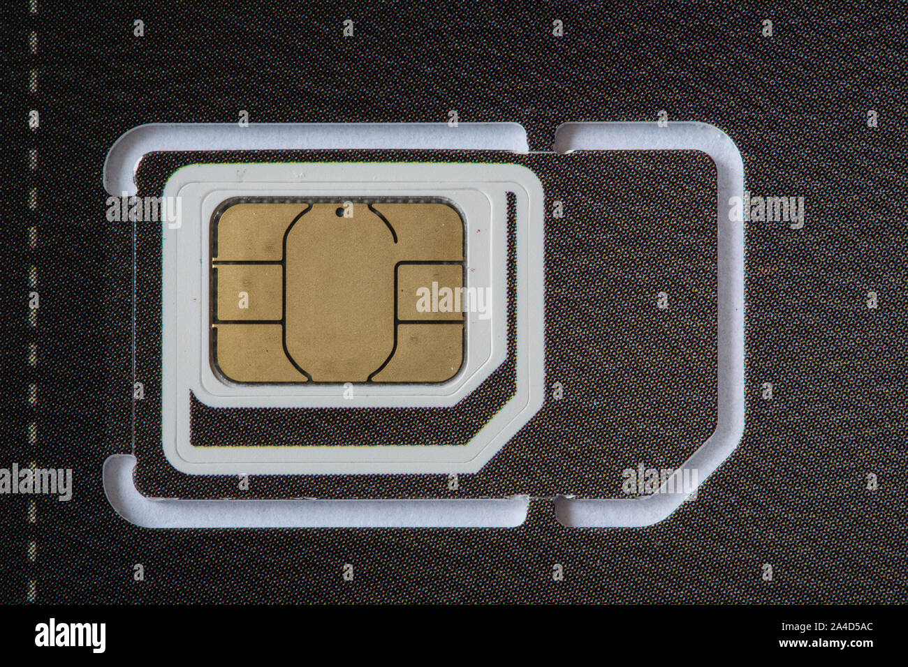 Le schede SIM per telefoni cellulari di varie dimensioni, MicroSIM, Nano-SIM, Foto Stock