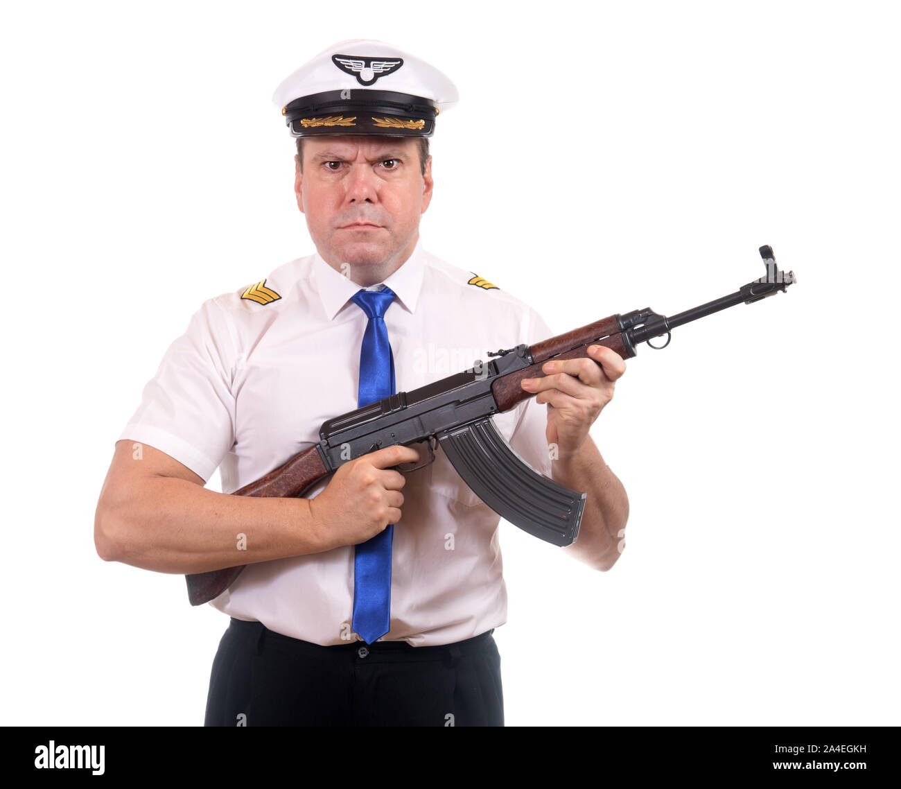 Il pilota è armato di pistola di tommy, isolato su sfondo bianco. Foto Stock