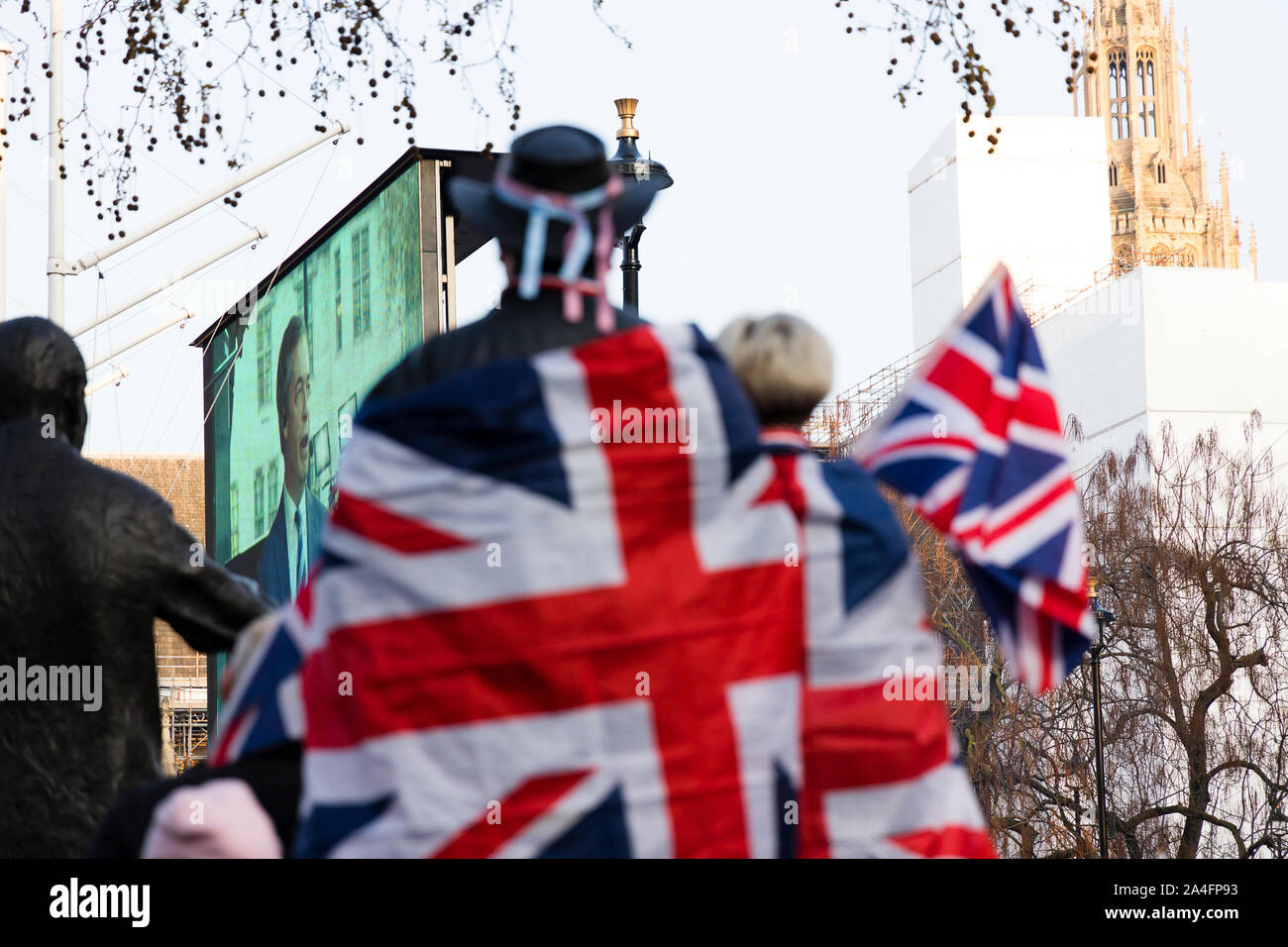 Londra, Regno Unito. Manifestanti avvolto nell'Unione bandiera ad una protesta Pro-Brexit. Foto Stock