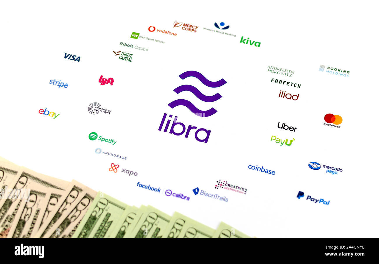 Nuova Associazione Libra logo con i membri che tirato fuori l'associazione. Stampato su carta come la brochure e le fatture del dollaro collocato sulla sommità. Foto Stock