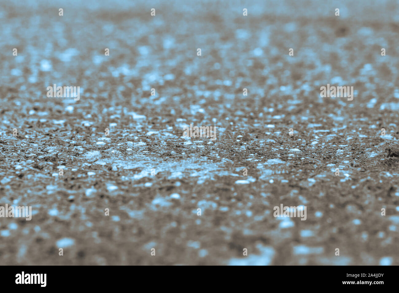 Macchie blu su sfondo grigio, turchese spot su sfondo nero, digital riempimento texture Foto Stock