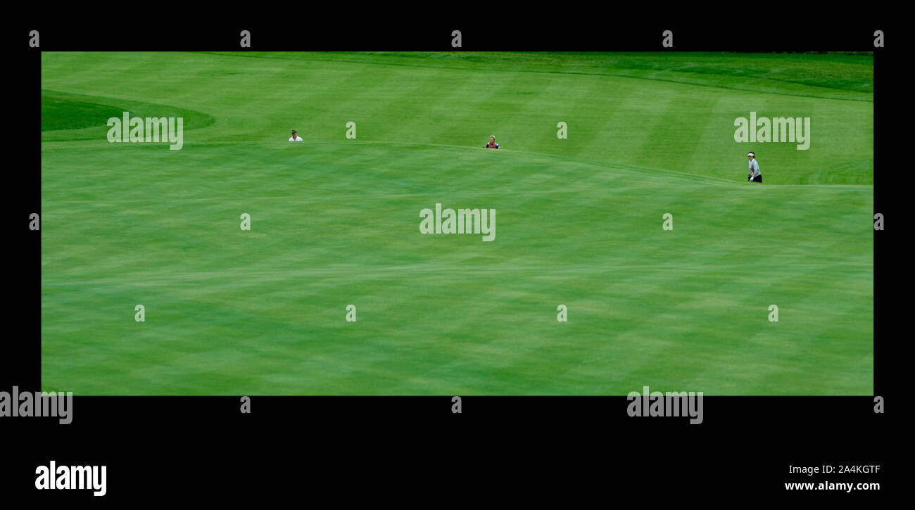 Giocare a golf Foto Stock