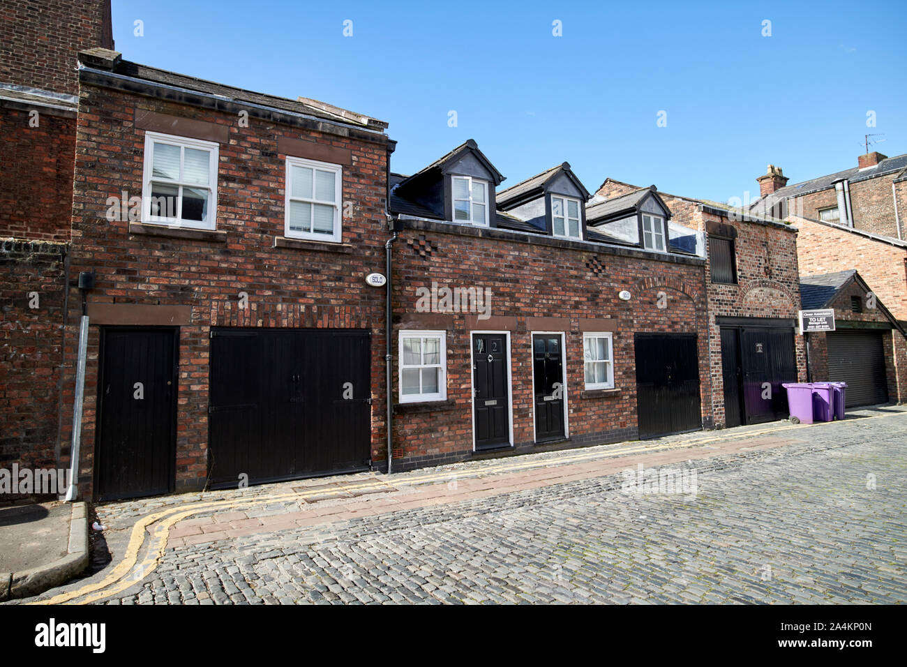 Ex coach house convertito in edilizia residenziale in Via del Pellegrino Liverpool England Regno Unito Foto Stock