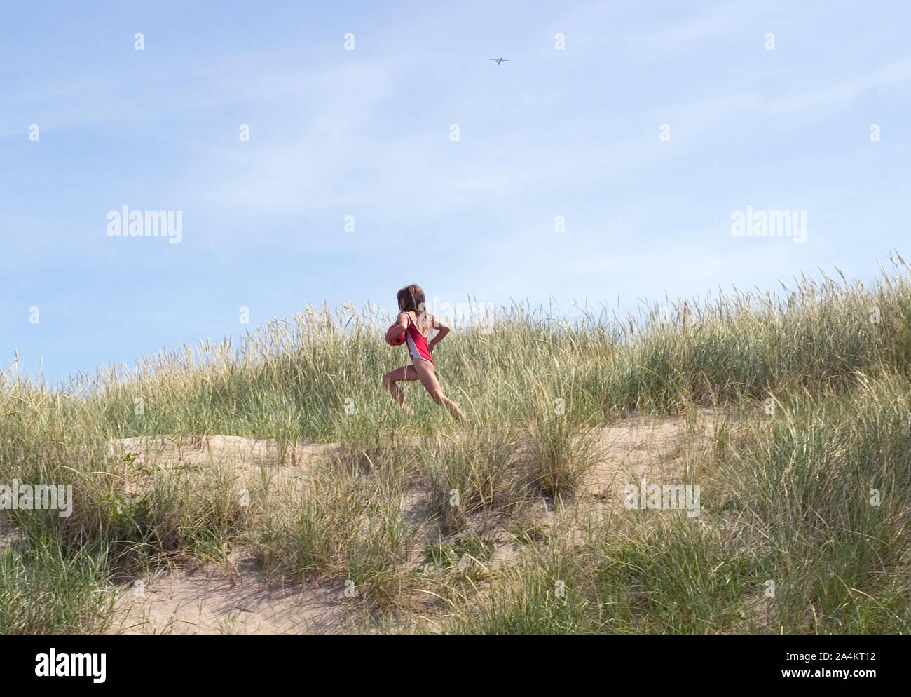 Ragazza sulla spiaggia Foto Stock