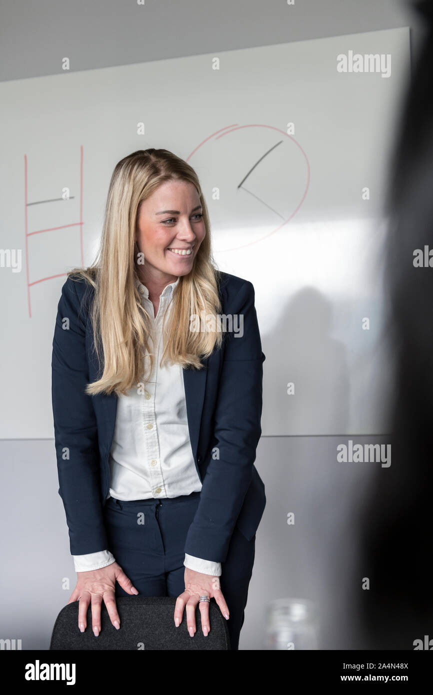 Donna al business meeting Foto Stock