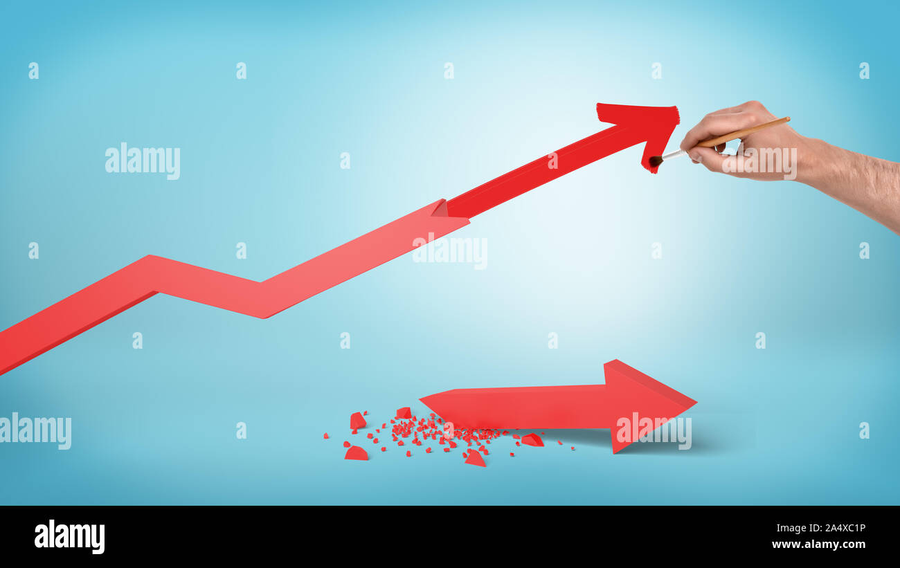 Un maschio lato disegna un nuovo punto di partenza per una statistica di rosso la freccia invece di un rotto e un caduto uno. Foto Stock