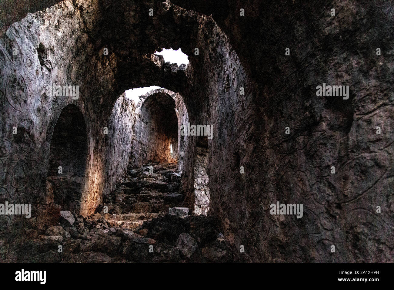 Vi secolo rovine della chiesa sull isola Gemiler, Riviera Turca, Turchia Foto Stock