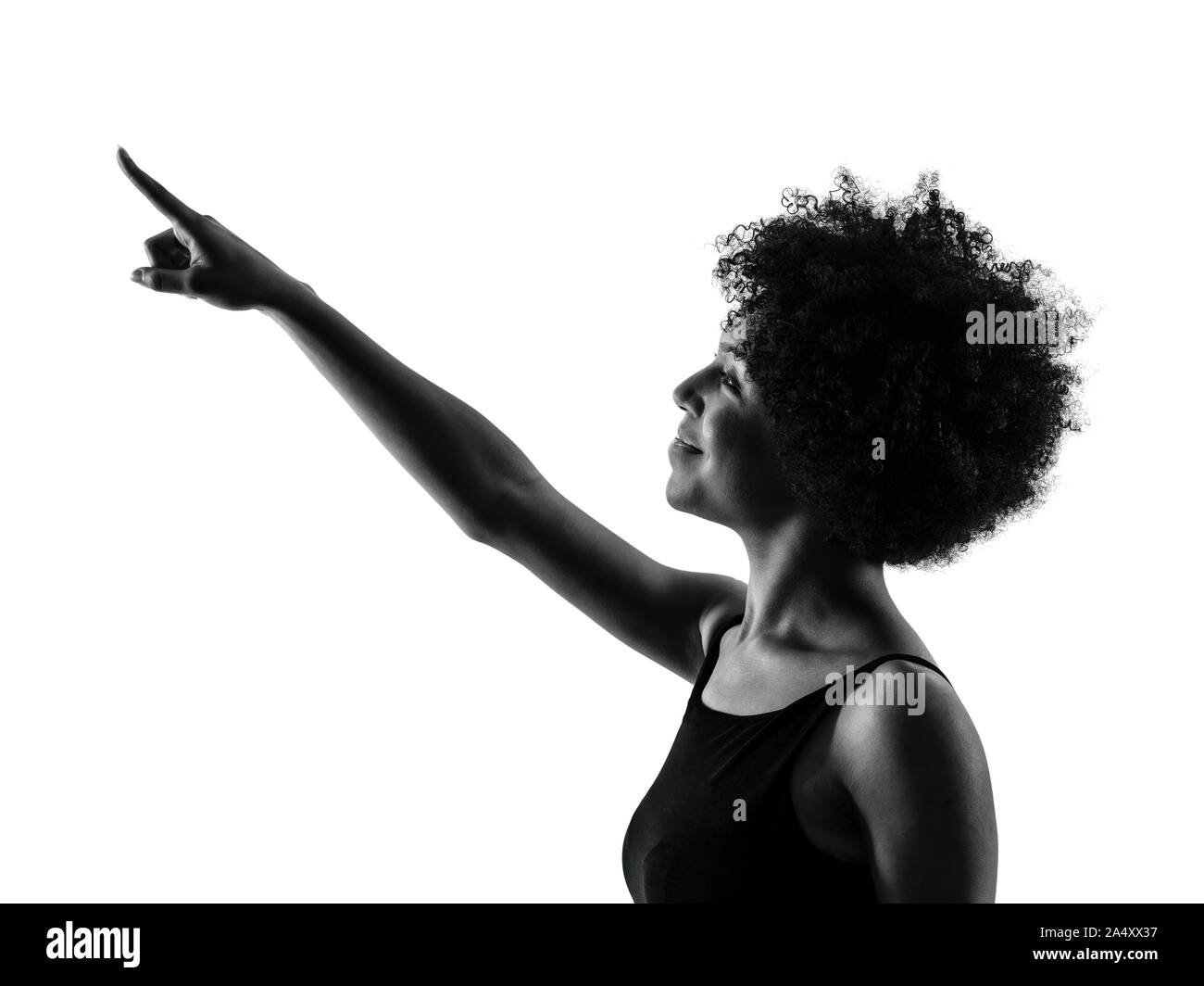 Una razza mista africana di adolescente Ragazza donna rivolta in studio ombra silhouette isolati su sfondo bianco Foto Stock