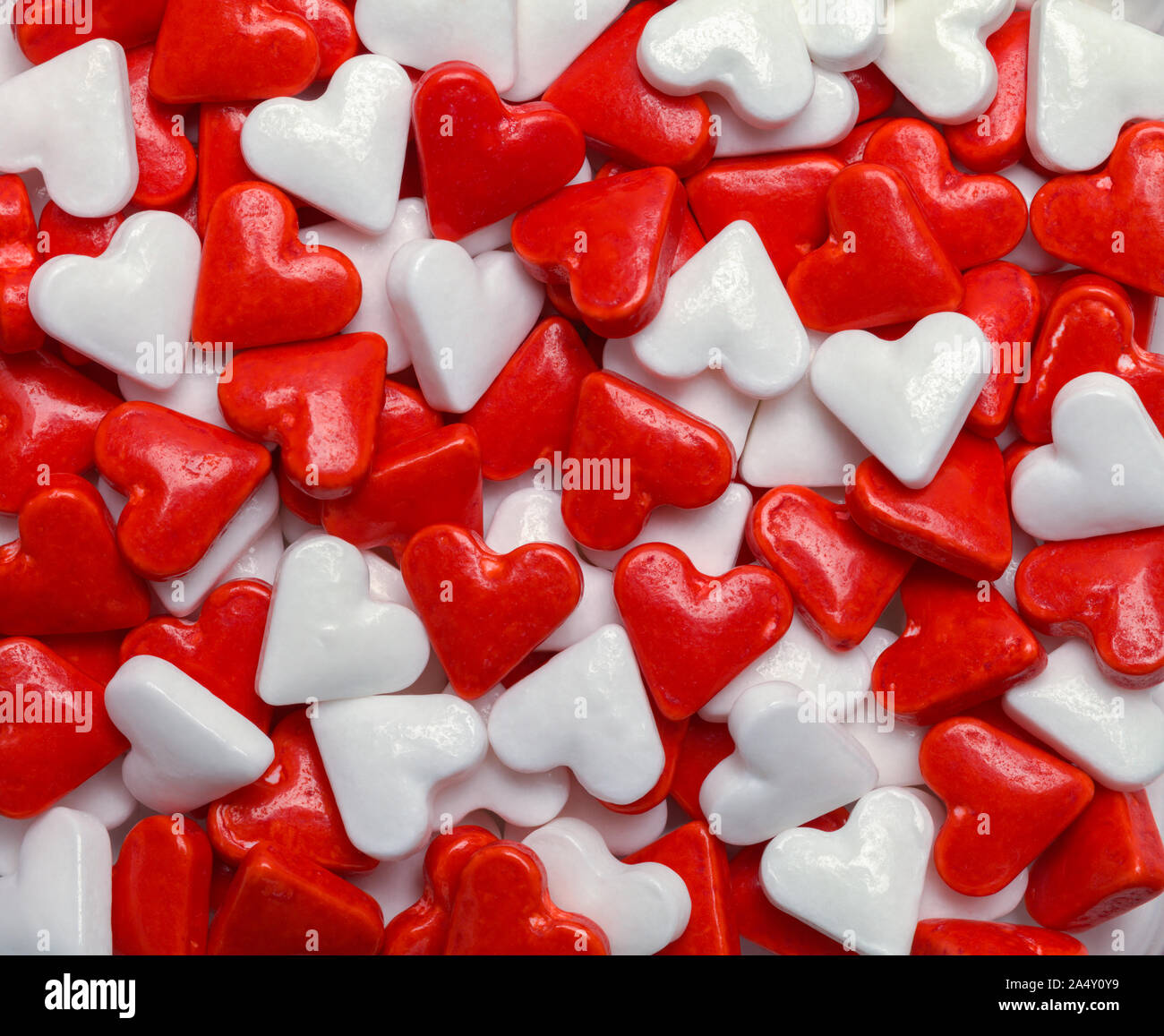 Il bianco e il rosso Valentino Candy cuori sfondo. Foto Stock