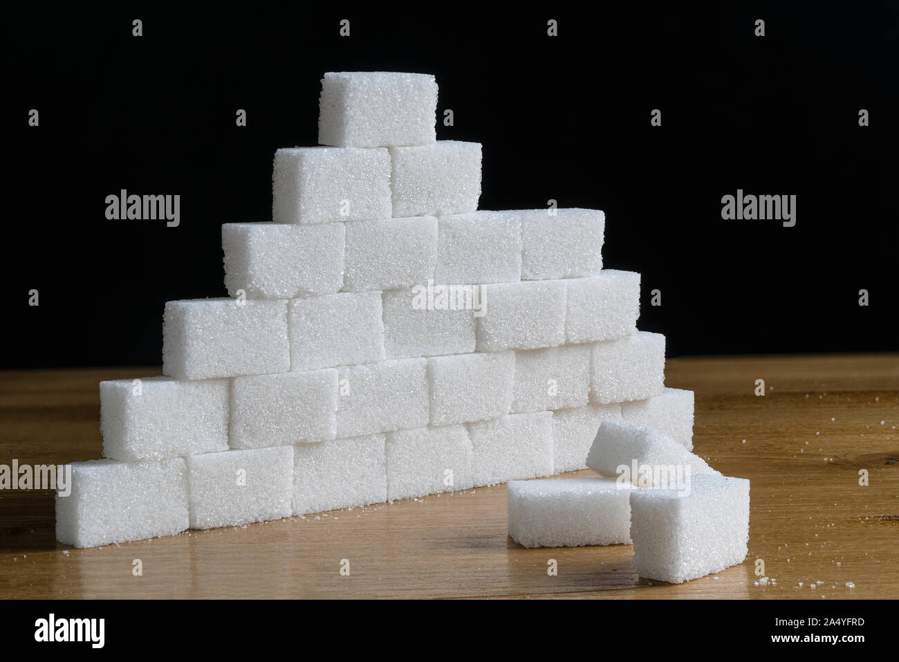 Una parete realizzata con cubetti di zucchero Foto Stock