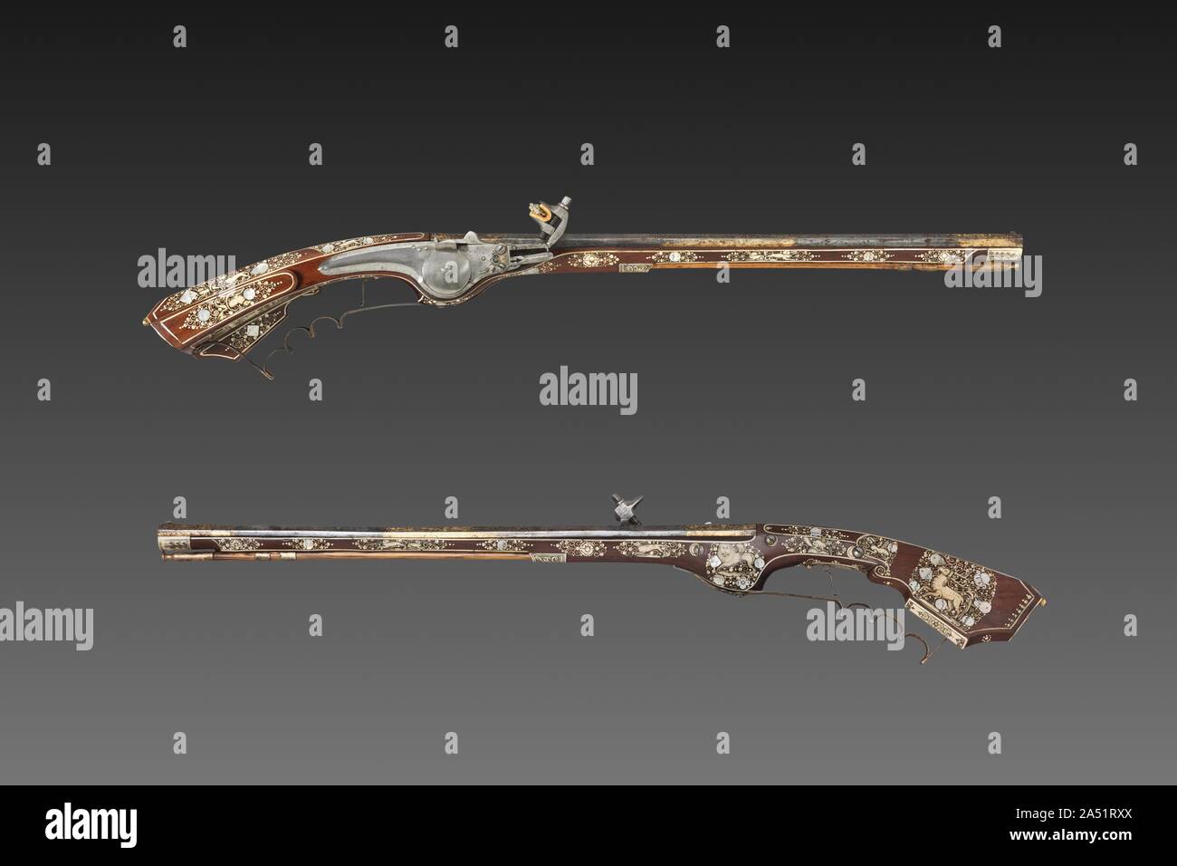 Coppia di blocco delle ruote Petronels, c. 1630. Un petronel era un tipo di pistola lunga fatta con una ruota di bloccaggio a contatto. Nonostante la sua lunghezza, il petronel è stato sparato al polso come una pistola e non alla spalla come un fucile. Essi sono generalmente realizzati in coppie durante i primi 1600s. Le versioni civili erano riccamente decorate per i client aristocratica. Foto Stock