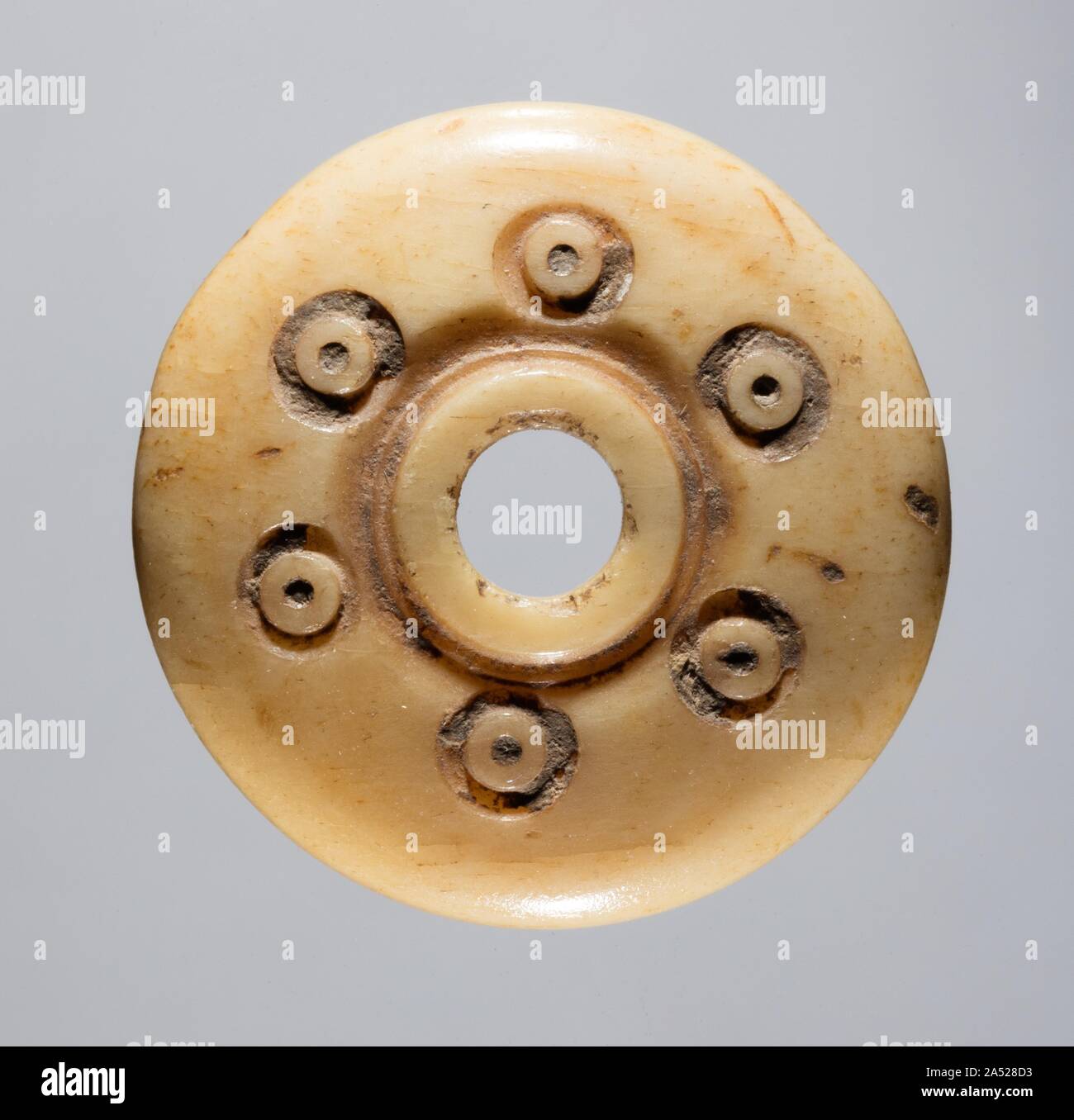 Mandrino Whorl, 700s - 900s. Foto Stock