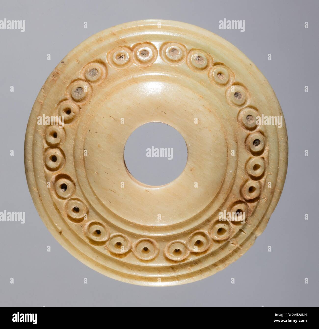 Mandrino Whorl, 700s - 900s. Foto Stock