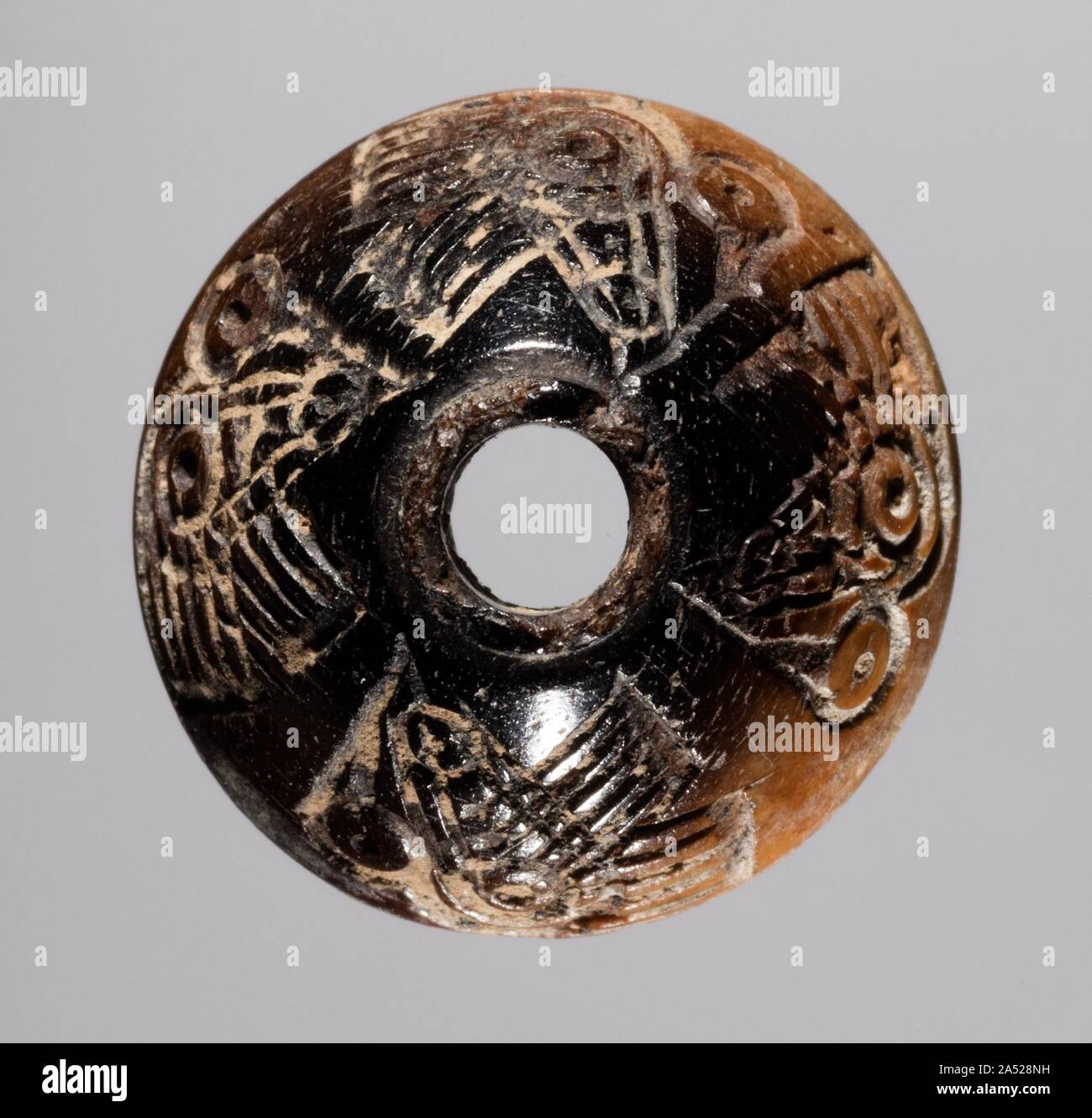 Mandrino Whorl, 700s - 900s. Foto Stock