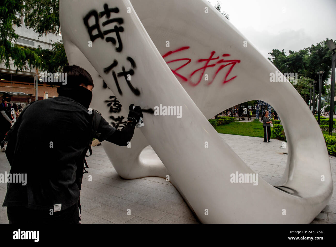 Hong Kong i manifestanti spray graffiti per le strade di Hong Kong Foto Stock