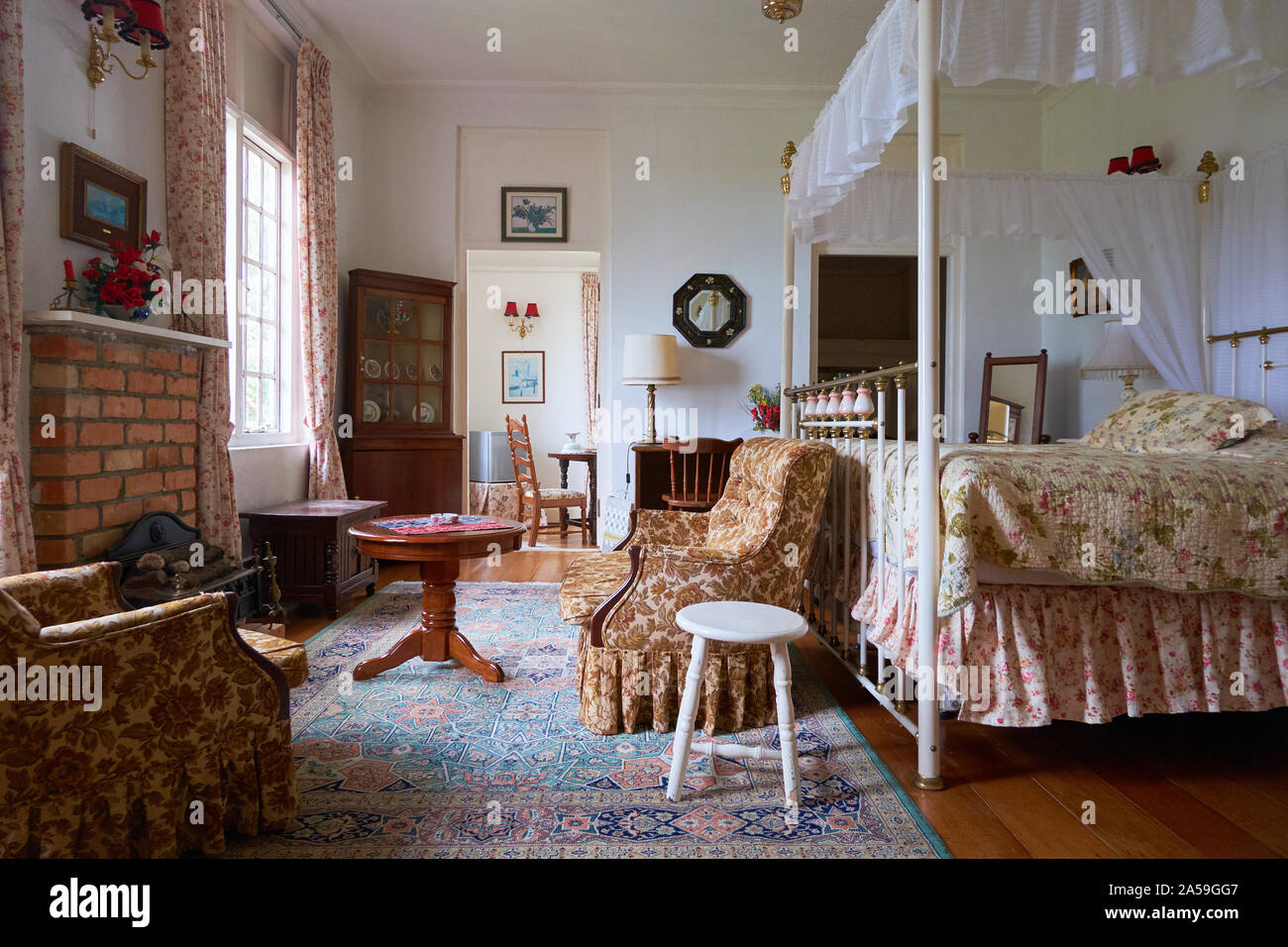 Un coloniale inglese era hotel in stile sala interna a Ye Olde Smokehouse in Fraser, Hill, Malaysia. Foto Stock