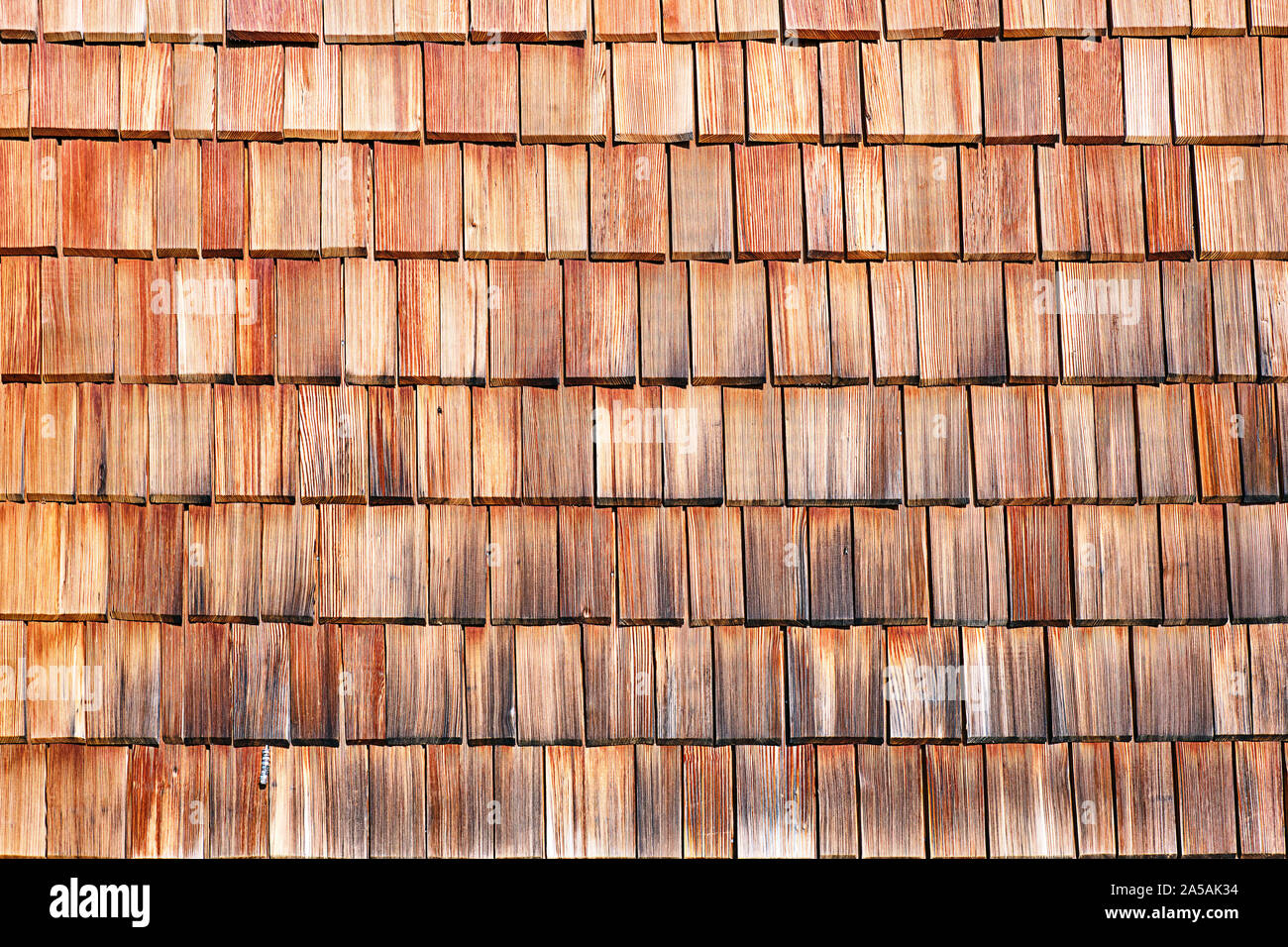 Sfondo da un muro fatto di scandole di legno, visto in Baviera, Germania Foto Stock