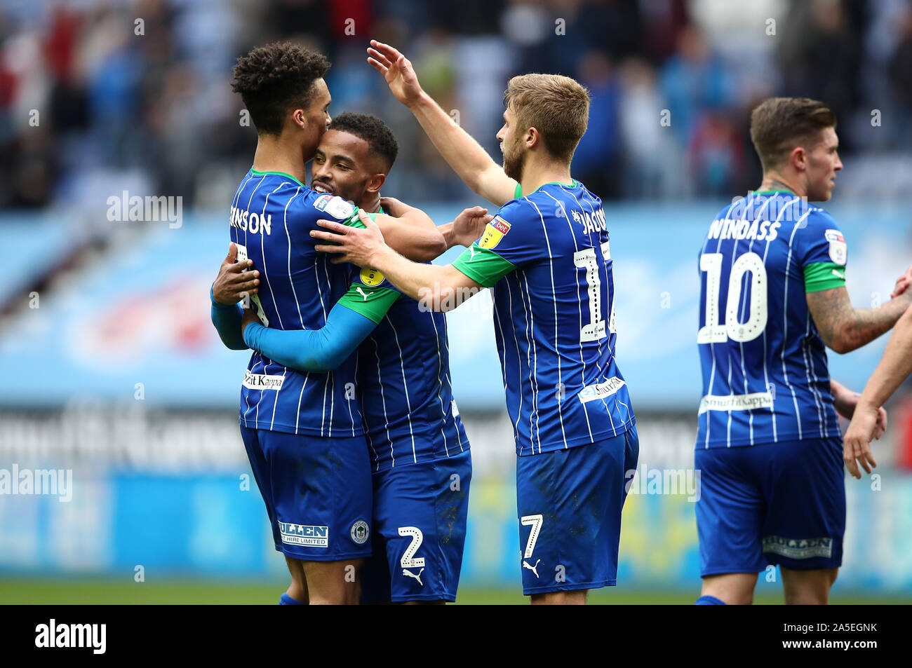 Wigan Athletic's Antonee Robinson, Nathan Byrne e Michael Jacobs reagire dopo il fischio finale durante il cielo di scommessa match del campionato al DW Stadium, Wigan. Foto Stock