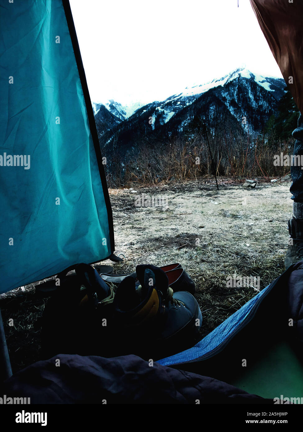 Scarpe da trekking e campeggio in ghiacciaio Foto Stock