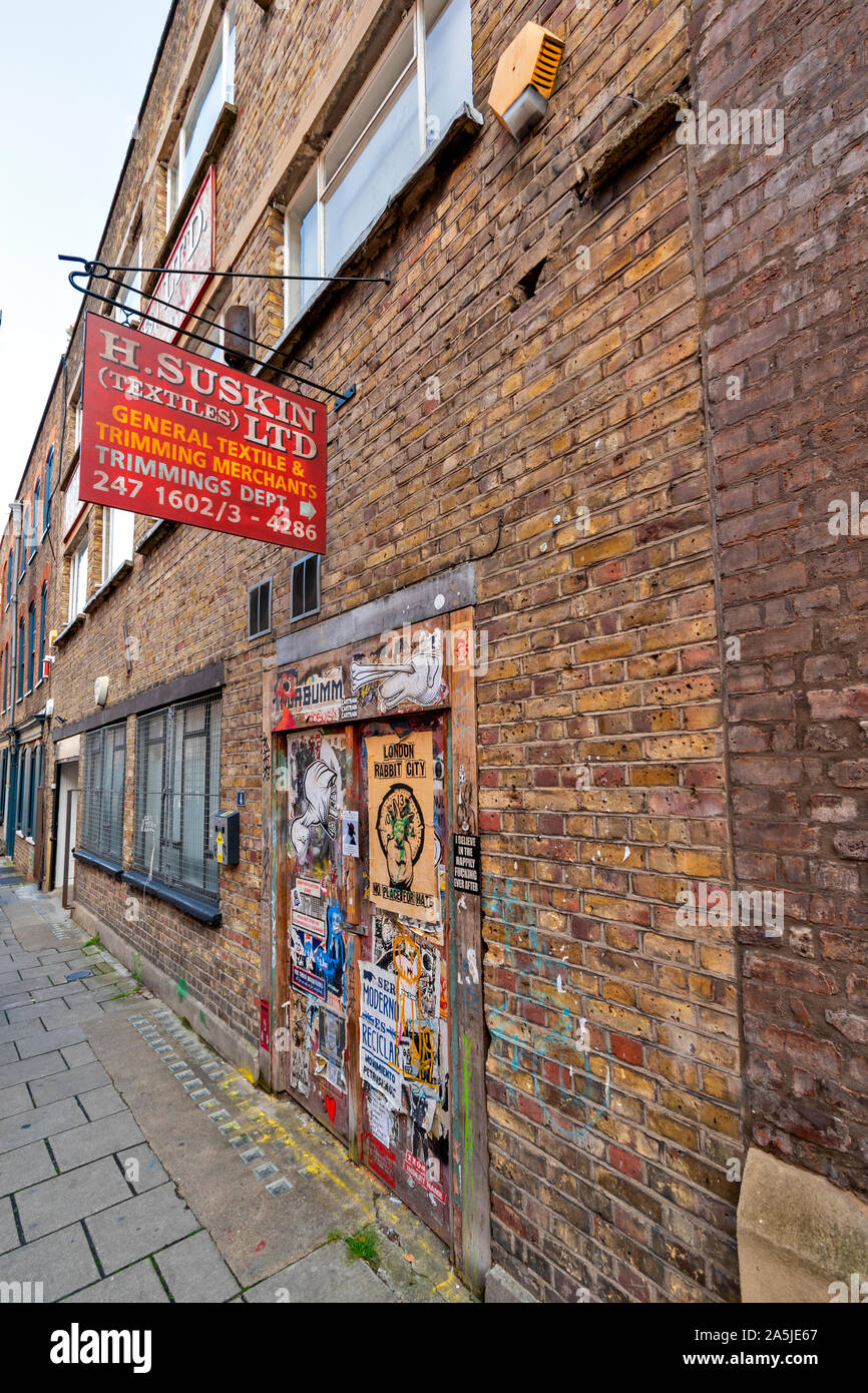 Londra SPITALFIELDS vecchio abbigliamento ebraico sign H SUSKIN TESSILI Foto Stock