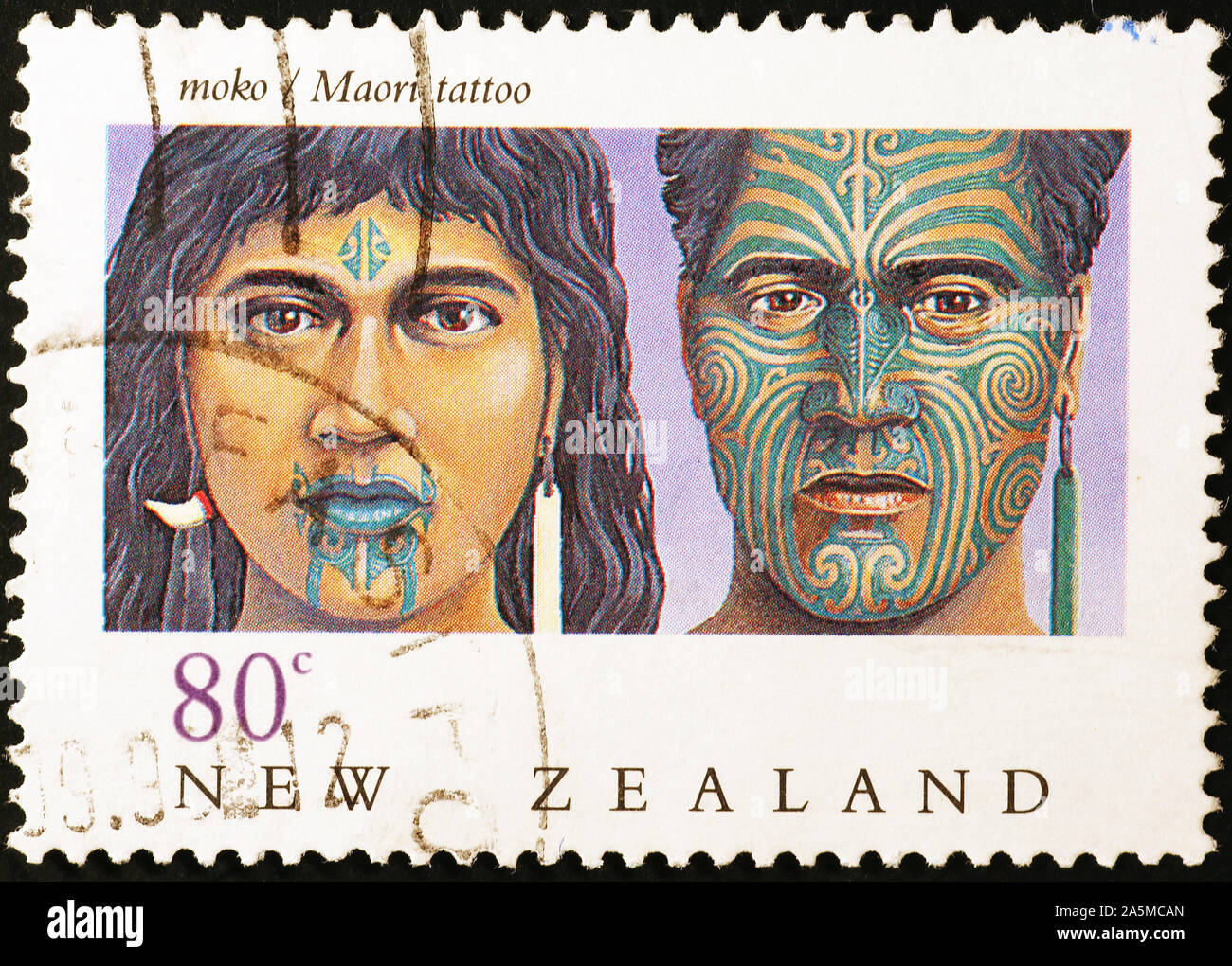 Maori tatuaggi facciali su Nuova Zelanda francobollo Foto Stock