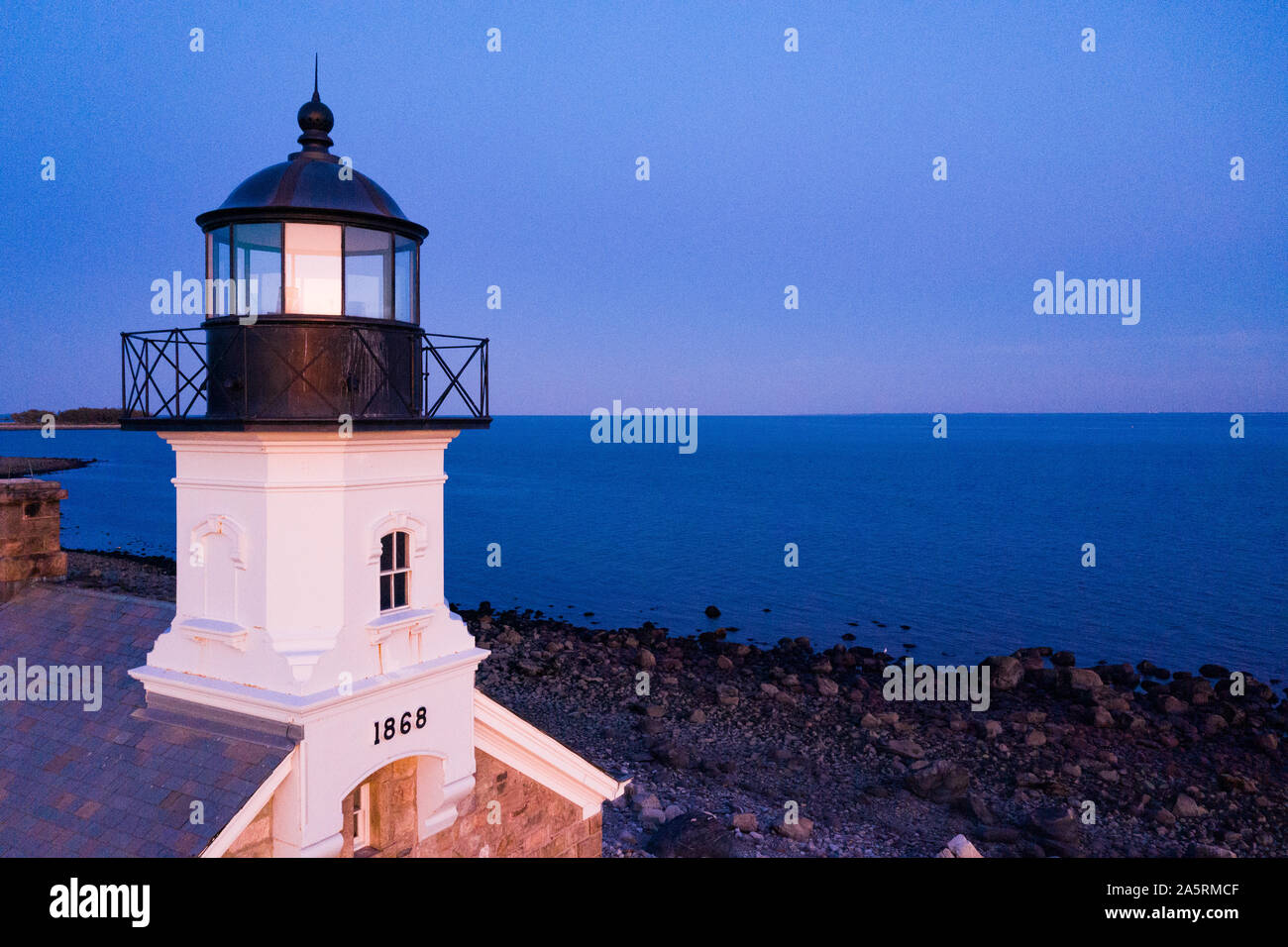 La Sheffield Island Lighthouse al tramonto. Foto Stock