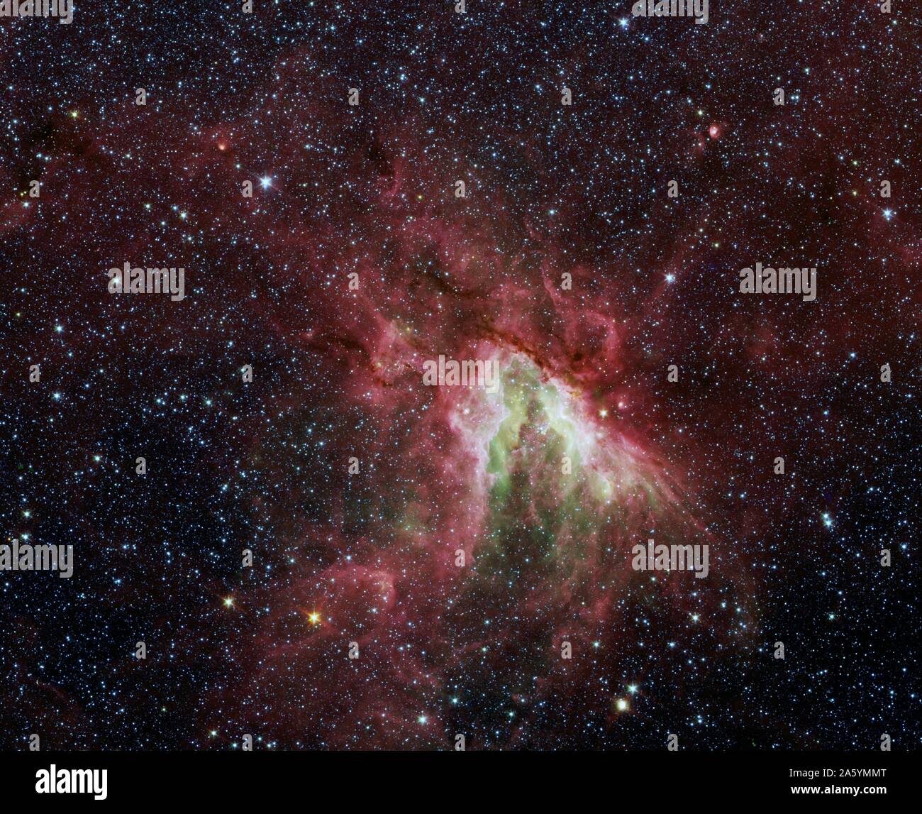 Una stella-rendendo il cloud denominato M17, o il cigno nebulosa. Situato a circa 6 mila anni luce di distanza nella costellazione del Sagittario. Telescopio spaziale Spitzer. Foto Stock