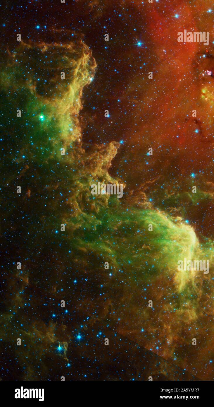 Questo paesaggio di vorticazione di stelle è noto come il Nord America nebulosa. Spitzer. Foto Stock
