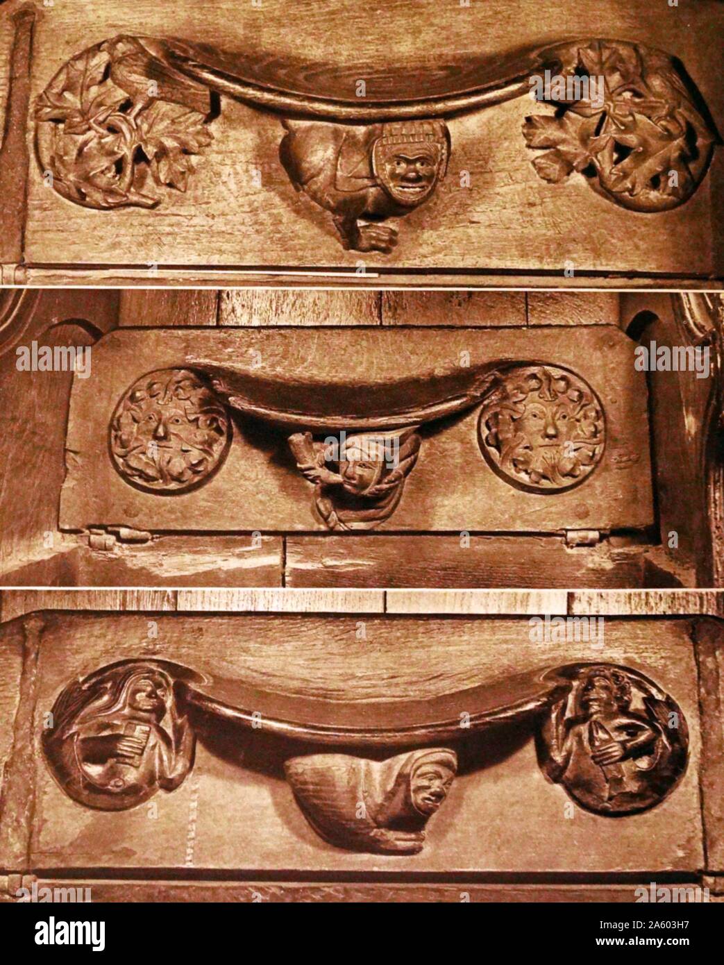 Stampa fotografica che mostra misericords scolpito nel coro della cattedrale di Winchester, una chiesa di Inghilterra nella cattedrale di Winchester. Foto Stock