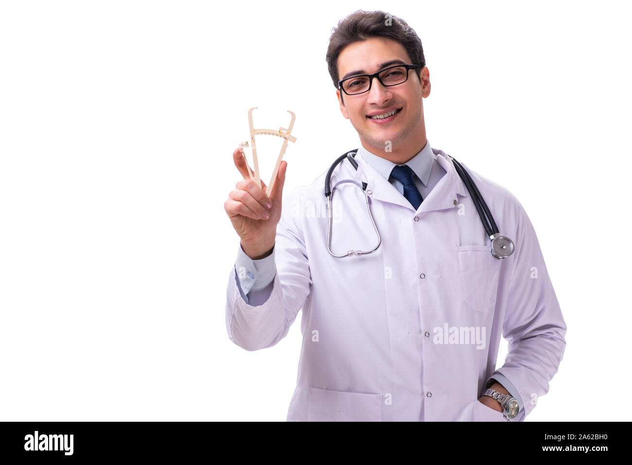 Il giovane maschio medico con calibri isolato su bianco Foto Stock