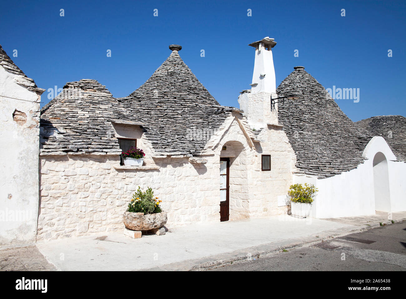 Italia Puglia: Alberobello. Case di Trulli, tradizionali pugliesi in pietra a secco di capanne Foto Stock