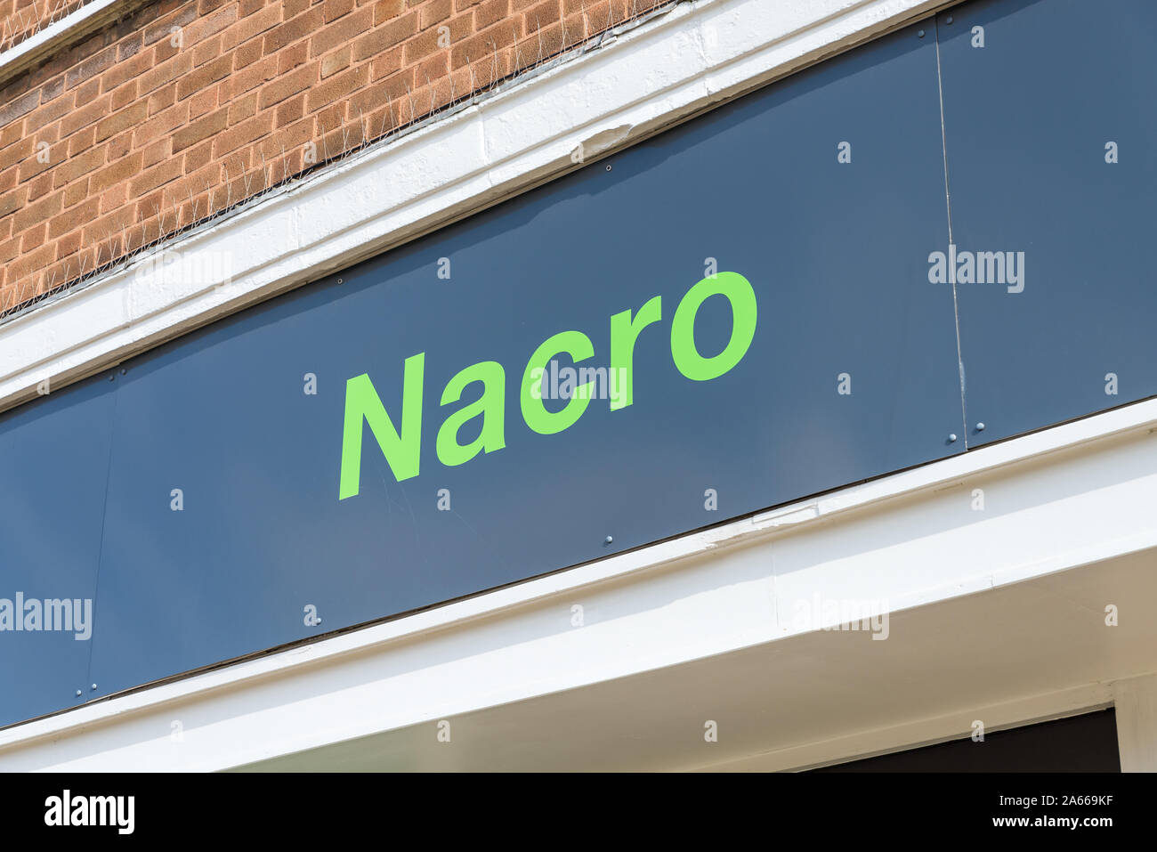 Segno per la giustizia sociale la carità Nacro in Aston, Birmingham, Regno Unito Foto Stock