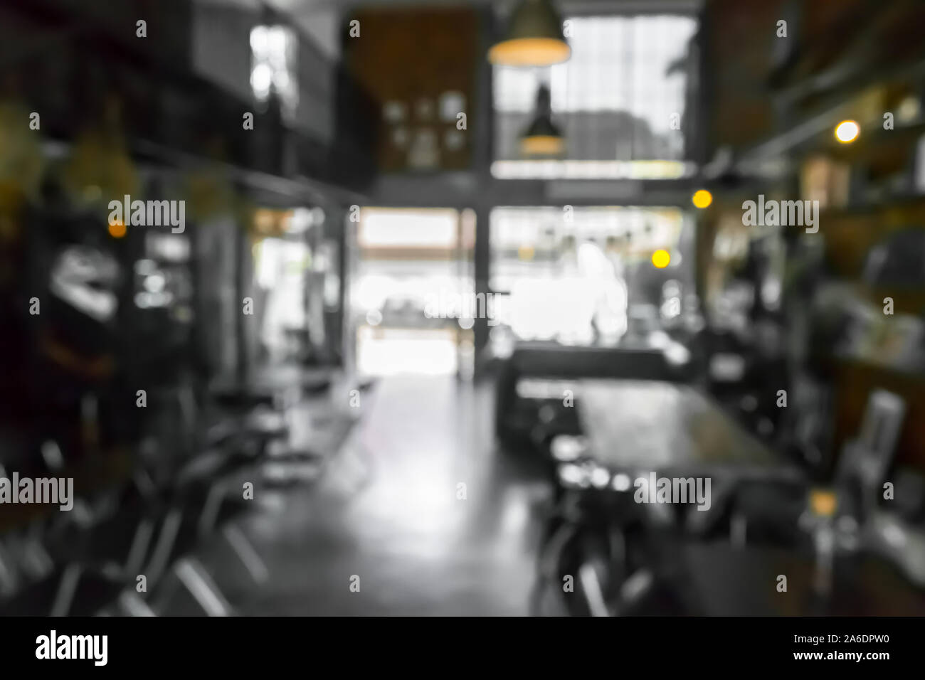 Cafe la sfocatura dello sfondo bokeh di fondo con luce. Ristorante abstract blur. Foto Stock