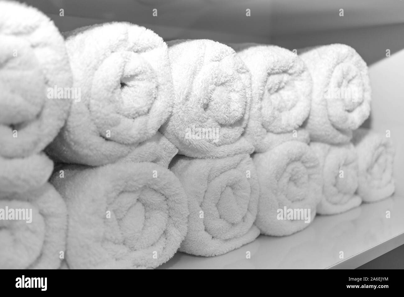 Ordinatamente arrotolata palestra asciugamani Foto Stock