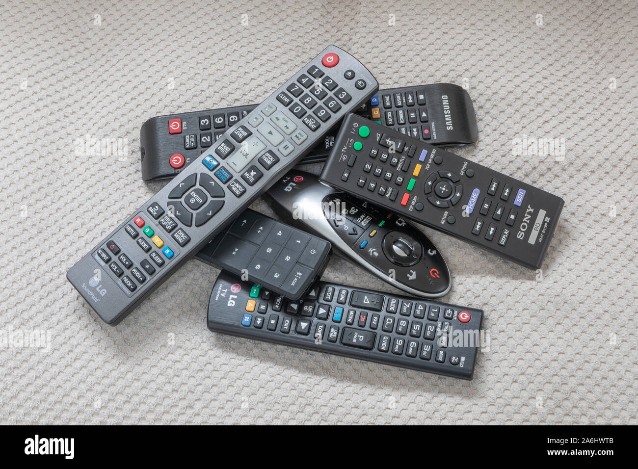 TV, Video e dvd player controlli remoti Foto Stock