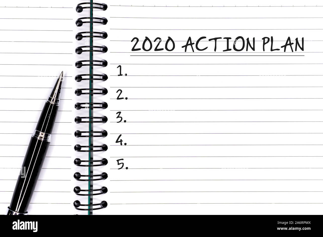 Anno nuovo concetto - 2020 Piano d azione del testo in Blocco note con penna. Foto Stock