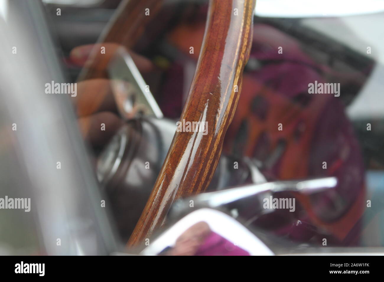 Un primo piano del volante in un modello 1969 Trionfo GT6 mk2 Foto Stock