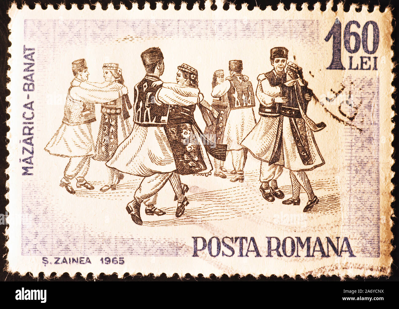 Rumeno tradizionale ballerini su vintage francobollo Foto Stock