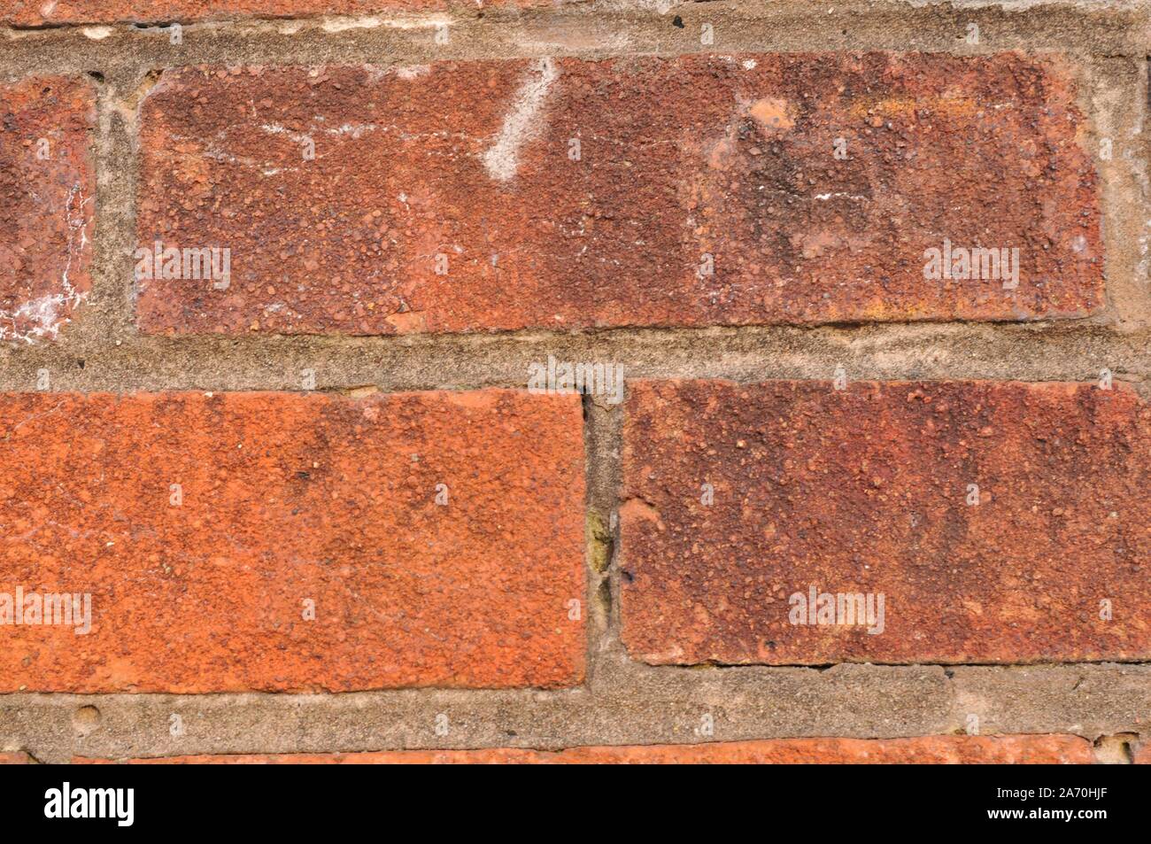 Vecchio Weathered Red muro di mattoni Foto Stock