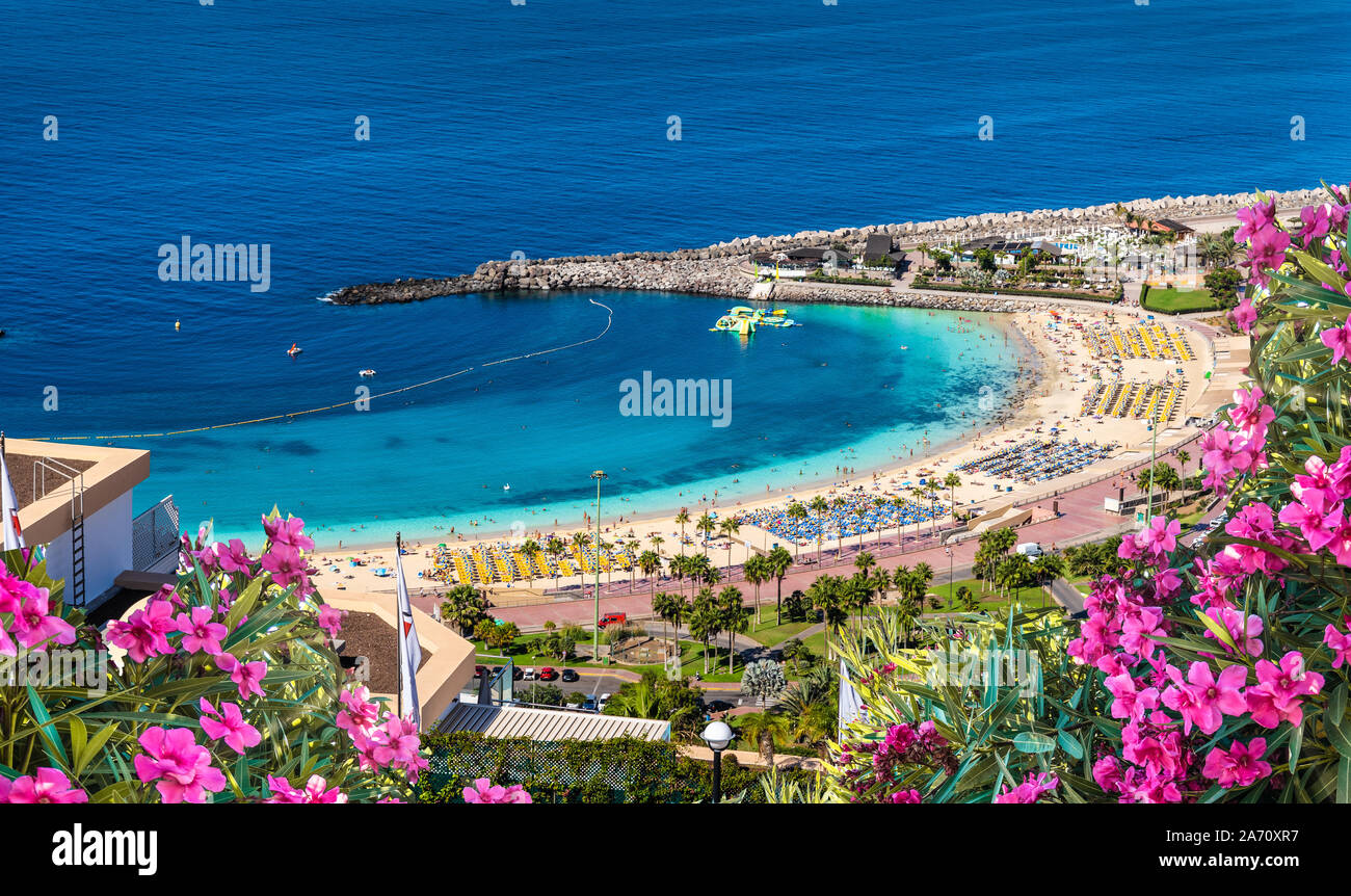 Paesaggio con tramonto a spiaggia Amadores su Gran Canaria, Spagna Foto Stock