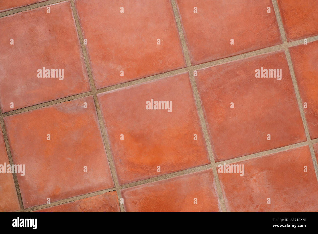 Pavimento in piastrelle di terracotta sullo sfondo - piastrelle di terracotta closeup Foto Stock