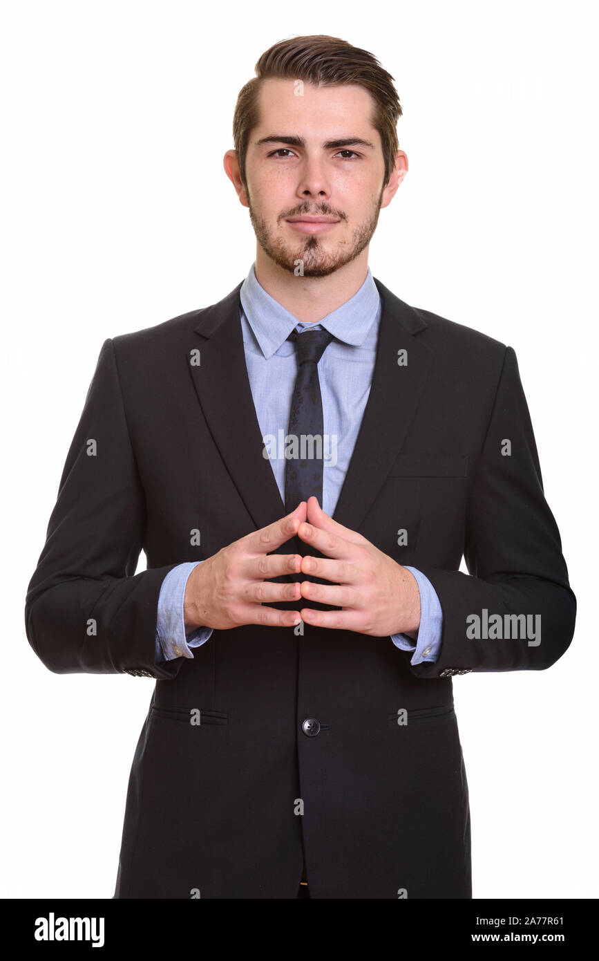 Ritratto di giovane bello barbuto imprenditore nel soddisfare Foto Stock