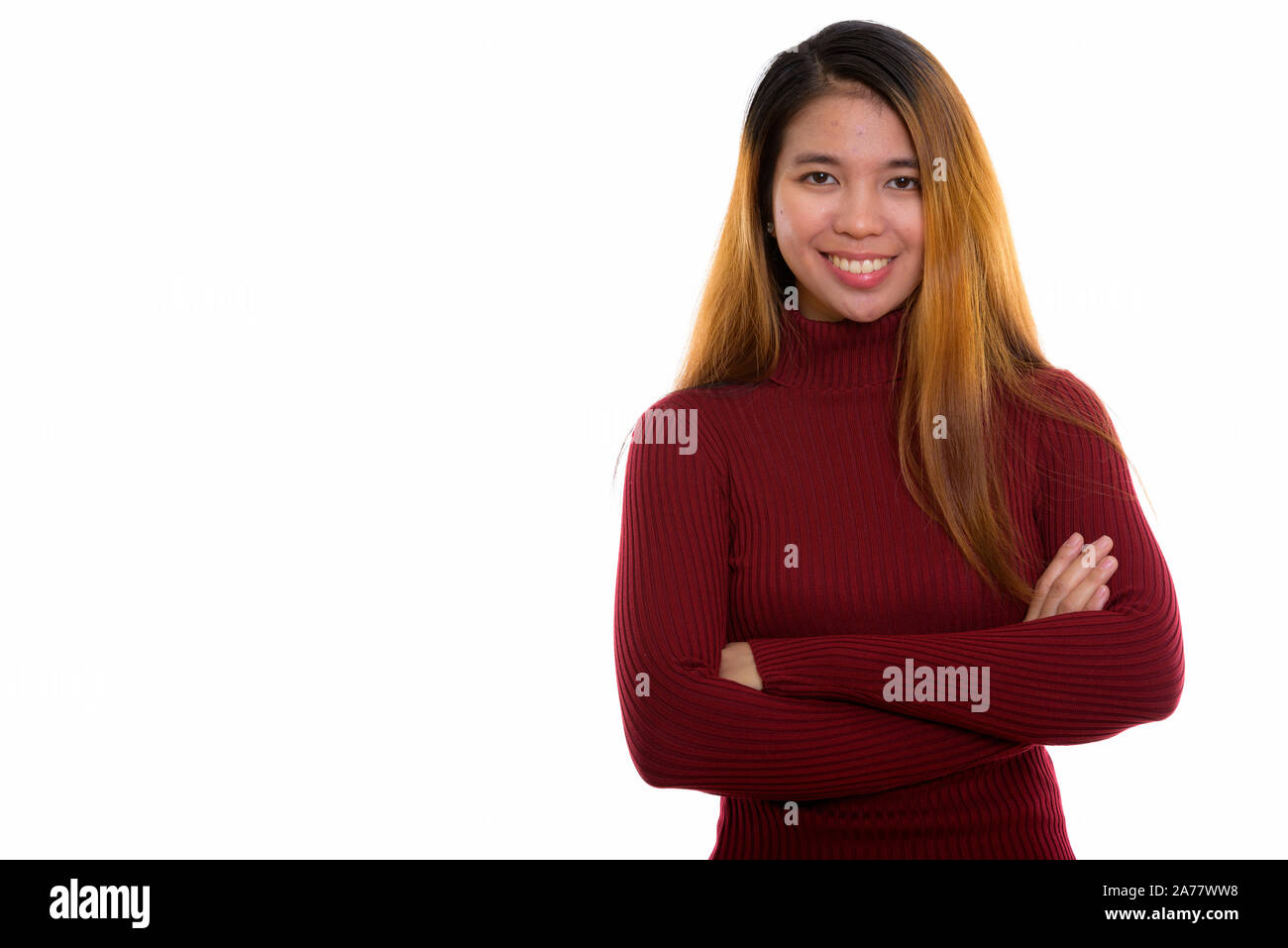 Studio shot della giovane donna asiatica con turtleneck maglione Foto Stock