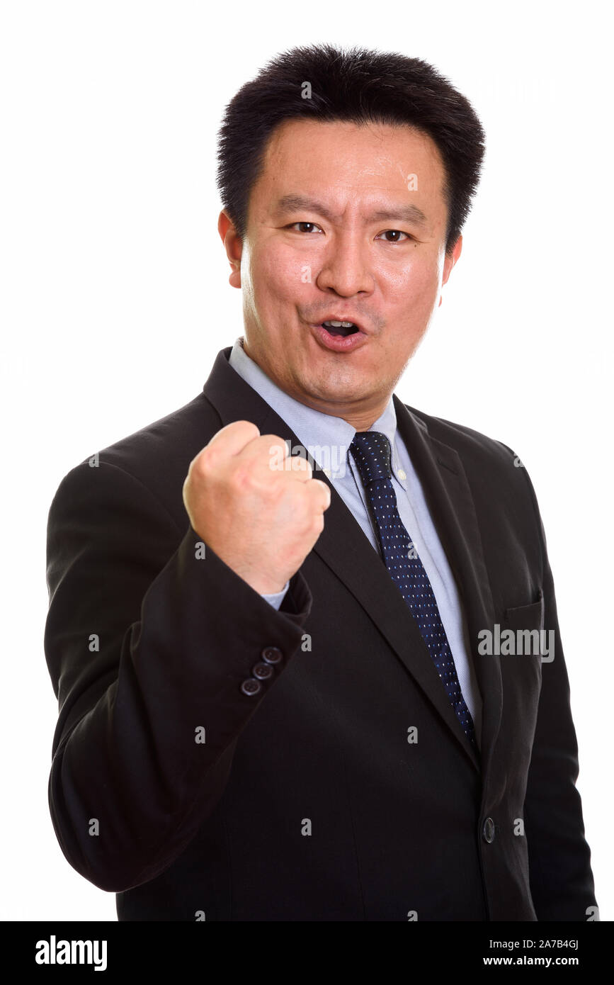 Studio shot di giapponese uomo isolato contro uno sfondo bianco Foto Stock