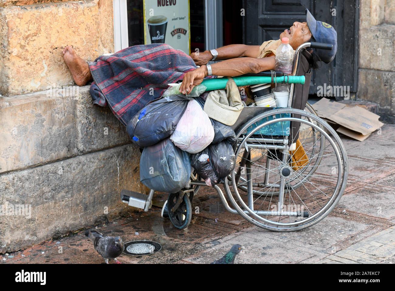 Povera persona in sedia a rotelle , Merida Messico Foto Stock